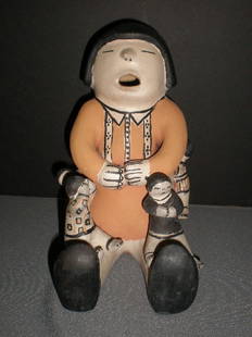 Cochiti polychrome story teller, artist: Helen Cor: Cochiti polychrome story teller, artist: Helen Cordero, Cochiti, N Mex appears on base, 8.25" tall, 7.75" at base, features 6 children, condition good, no damage or repairs