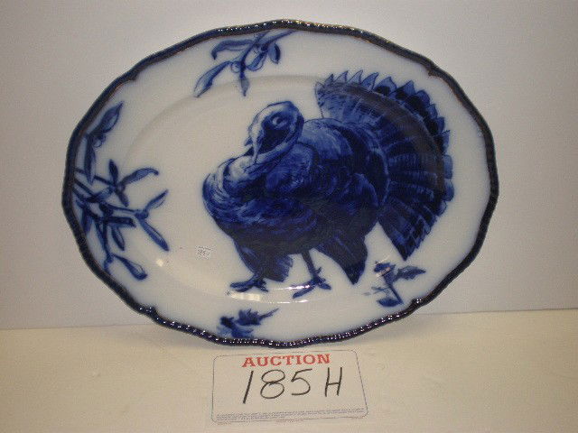 Royal Doulton turkey platter. Flo blue with cobal: Royal Doulton turkey platter. Flo blue with cobalt edging and gobbler center, cobalt RD mark, impressed Doulton mark, 22" x 18".