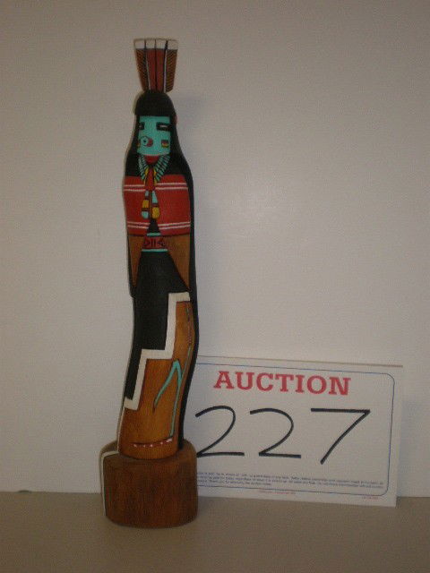 Hopi wooden Kachina doll. "E.N.", "Mana" figure, d: Hopi wooden Kachina doll. "E.N.", "Mana" figure, decorated with black, white, red, yellow and turquoise paint, 16" H.