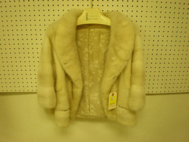 White Mink Jacket: White mink jacket.