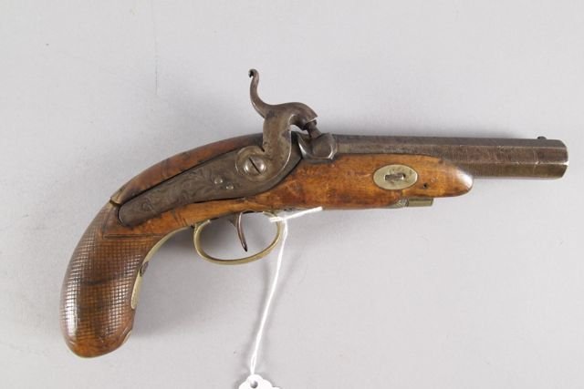 Cap and Ball Pistol: Cap and ball 1840s style large caliber boot pistol with hand engraving on barrel (working), typical crack at end of lock plate and missing ramrod.