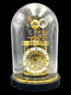 Hermle Astrolabium Mantel Clock: The highly accurate quartz regulated astrolabium has a month and zodiac disc and a sun, moon and earth ball. Through the visible highly intricate gear train system, the astrolabium clock reproduces