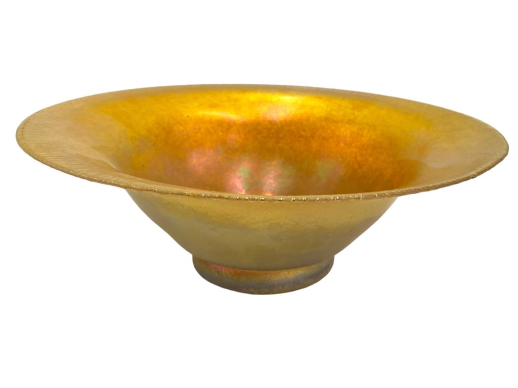 Stueben Gold Aurene Fruit Bowl 714: Gorgeous gold Aurene glass fruit bowl. Stands 3.5 inches tall and is just under 10.75 inches across. Unique irregular edges from stretch process. Minor pocking from in the making process. Signed STUEB