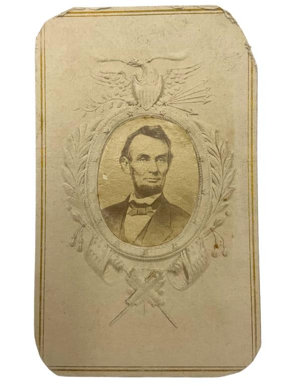 Rare Abraham Lincoln Embossed Photo Card: Embossed Union wreath framing. Measures 4 x )us to er 2.25 inches. Corner wear to card and speck on photo card. Possibly a CDV.