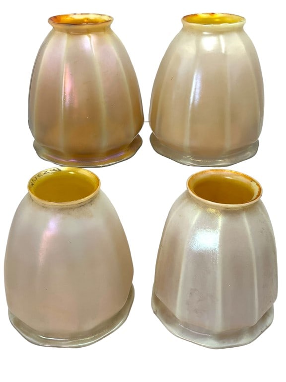 Quezal Iridescent Glass Shades: Only one is marked Quezal. All have same coloration in a frosted marigold iridescent. Each top hold is just under 2.25 inches and all four are 4.75 inches all. Minor flea bites along top lip.