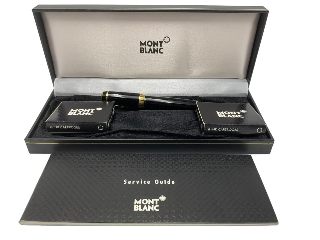 Mont Blanc Boheme Rouge Line Fountain Pen: Black with gold plated trim and a clip jewel. The clip jewel is a transparent synthetic ruby.Nib is a retractable Medium Cursive Italic 4810 Montblanc 18k gold nib. It's firm and smooth with lots of t