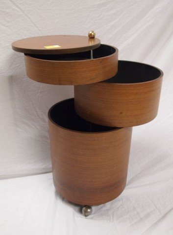 Knoll? 3 section cylinder table/liquor service: cabinet wood exterior and white interior on 4 casters; no identifying marks -- from same home as the Knoll; 26.25" tall, 13.75" diameter; drawers -- 3" - 6" - 12"; few light bruises.