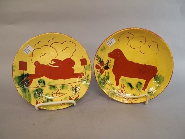 Redware Pottery Plates: Two 7" redware pottery plates by Breininger, 1981 and 1987, rabbit and a sheep.