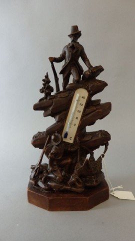 Black Forest Carving: Measures 10.25"T x 5.5"W Black forest table top thermometer depicting hunters on rocky hill side. As is condition
