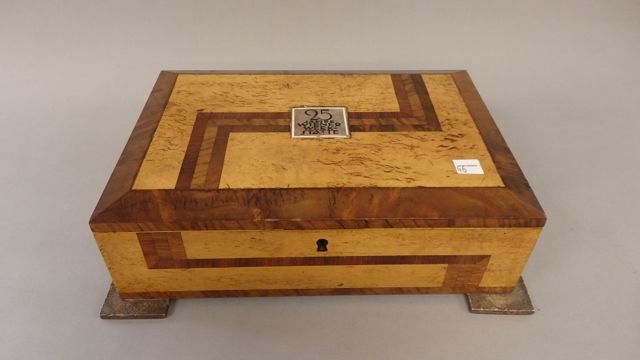 Wiener Werk Statte Mixed Wood Dresser Box: Box measures 8.75" x 12.75" x 3.5" T. Wiener Werk-Statte Burl maple and mixed wood box mounted on 2" x 2" hammered feet with inset metal tag which reads 25 Jahre Wiener Werk-Statte