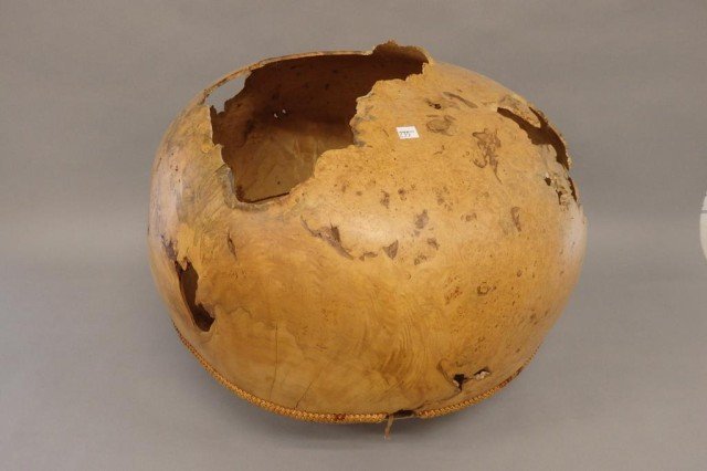 David Ellsworth Wood Bowl: Norway maple burl 17" tall x 21" dia. bowl w/leather strap adjoining top & bottom, some breakage, 1987