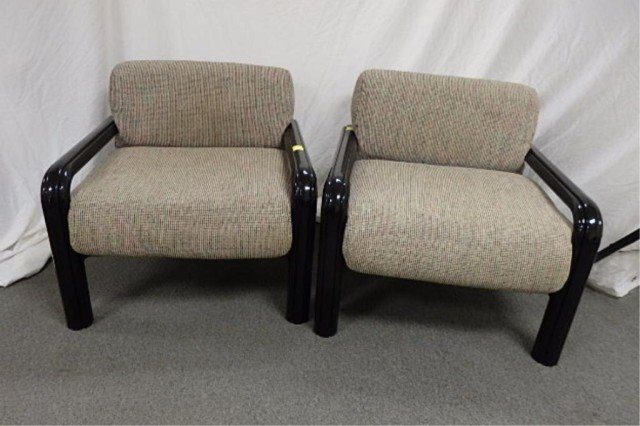 2 Knoll Gae Aulenti Chairs: 2 Knoll Gae Aulenti Chairs upholstered seat and back black tubular framed open arm. measures 32"Wide x 29" H on back