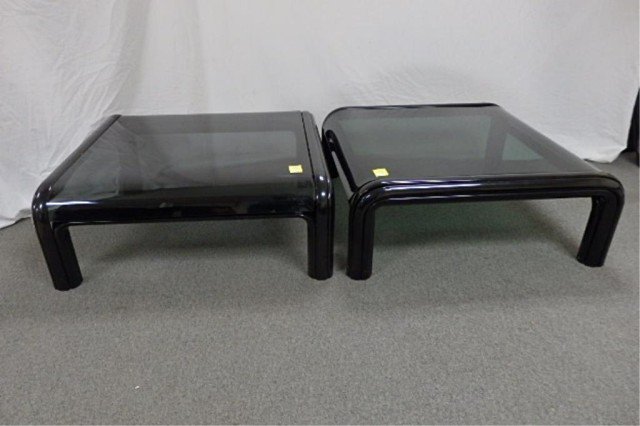 2 Knoll Glass Top Table: 34" x 34" x 13" Tall SMokey Glass top with rolled edges black tubular frame one tabletop corner damaged