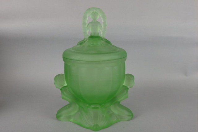 Art Deco compote: Green glass 9" tall compote, 2 full nudes on base and seated woman finial