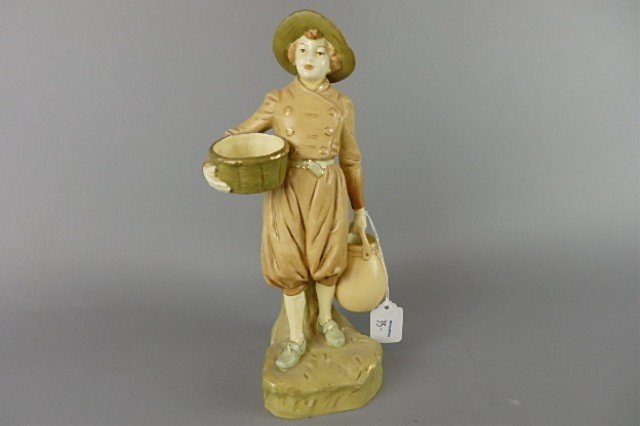 Royal Dux Figure: 11.25" T x 5.5" W at widest point figure of a young boy carrying a water barrell and a bucket.