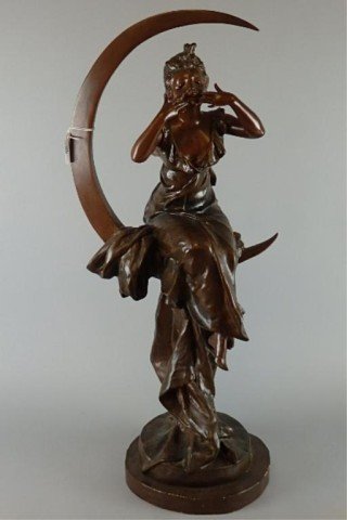 Bronze Figure: 29" T bronze figure of a woman seated on crescent moon, likely a lamp at one point in time, appears to be unsigned.