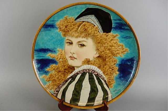 Minton Charger: 16.75" D, Minton Art Pottery Studio, Kensington Gore, charger, decorated with curly-haired profile of a young girl in a ruffled top with hat, artist signed R. Cleman