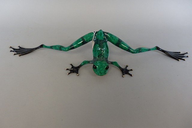 Bronze Frog Sculpture: 4" tall x 28" long bronze sculpture created by British artist Tim Cotterill (Frogman), Bottoms Up, limited 209/750.(2/16" visible circle bruise top left thigh of frog, bronze shows thru at contact)
