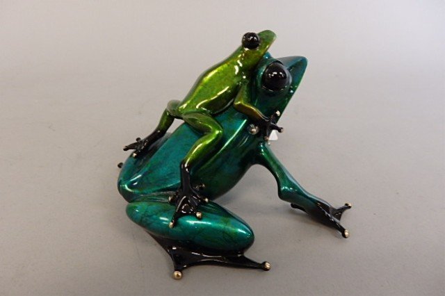 Bronze Frog Sculpture: 4" x 5" bronze frog sculpture created by British master artist Tim Cotterill, blue green frog with a young frog on his back, "Joyride," artist proof, 8/100, 2011, glue mark where young frog meets back