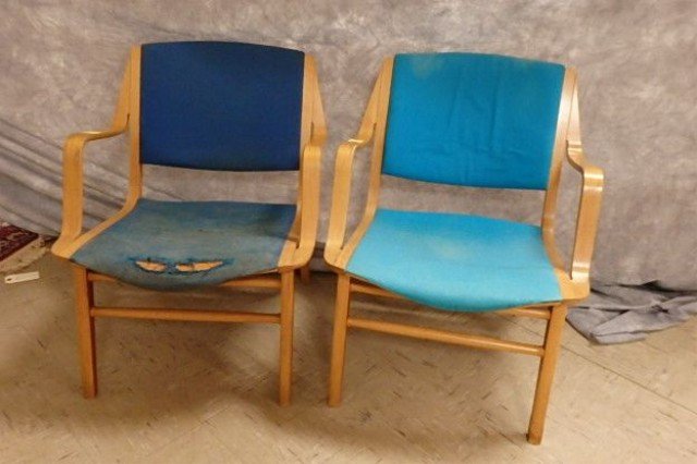 Two Peter Hvidt and Orla Molgaard Arm Chairs: by Fritz Hansen, model #6020, 1966, need re-upholstering (Bolivia Ice Blue) and wood cleaned up, tag on bottom of chair read "F. H. Made in Denmark, Danish." Right arm on both chairs has scuffs and sc