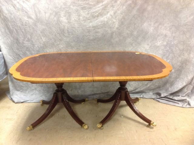 Oval Dining Room Table: 70" L x 46" w x 29" h, Council Craftsman metal tag attached to leg bracket on base, oval dining room table, Duncan Phyfe style, with three additional leaves, light mahogany border, very nice condition