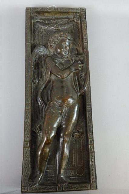 Italian Pottery Wall Plaque: 19 1/2" x 7" x 1 1/4" raised relief of winged child playing harp, impressed seal & no. 712, minor chip to lower right corner rear