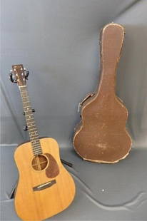 1945-D Martin Guitar & Case: 1945-D Martin Guitar (D-18 90907), condition: Top-12" crack just outside Pic guard- heaviest at guard, 3 other short and narrow cracks (difficult to see), On the back -11"crack left side of bridle, sm