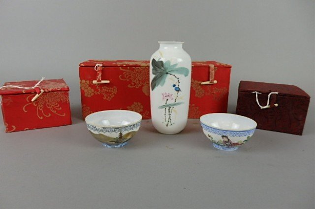 Three Eggshell Porcelain Items: Two 1.5" x 3.25" eggshell porcelain Chinese handleless cups, with fitted silk boxes, one cup depicting young women seated in garden, other depicting Pagoda & village, both signed; also a 6" eggshell p