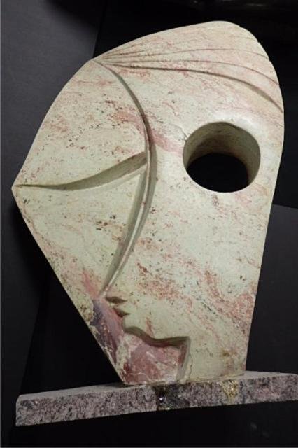 Shona Stone Carving: Measures 28" tall x 19" wide x 8.5 "D. Signed Weight approx 100-200 lbs. Artist: T. Bonjisi, Title: "Eye Witness" Medium: Leopard Rock