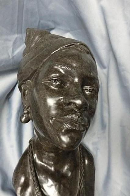 Stone Carving: Bust of Woman, Measures 24" T x 11" W x 11"D, weight approx. 100-200 lbs. Artist: Kakweza Everisto Title: "Dignified" Medium: Spring Stone