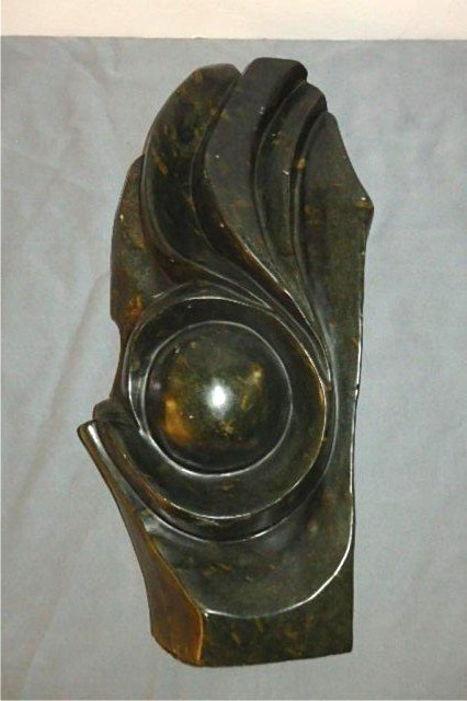 Stone Carving: Abstract Object, Measures 20" x 9.5L x 3.5" W Weight approx. 30-40 lbs. Artist: Unknown Title: Flower Medium: Spring stone