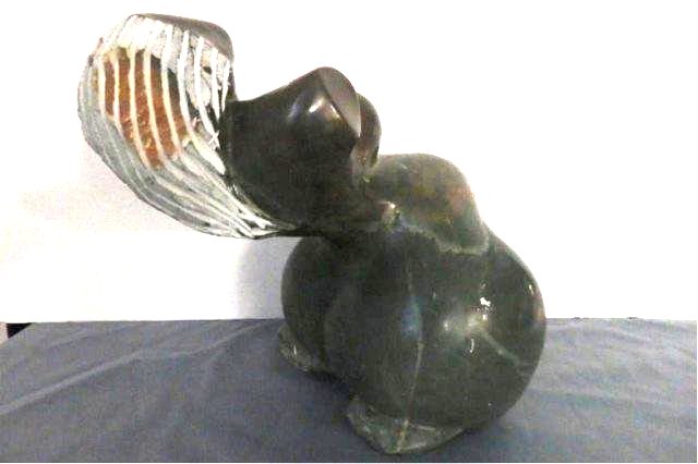 Stone Carving: Nude Woman, Measures 11" T x 16" W x 9"D Weight approx. 30-40 lbs. Artist: T. Charike Title: Posing Nude Medium: Fruit Serpentine