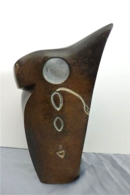 Stone Carving: Abstract, Measures 19" x 10" x 10" Signed, Weight approx. 40-50 lbs. Artist: Trysn/Simba Title: Moaning Bird Medium: Spring stone (an African bird disturbed by man-made climate changes)