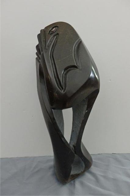 Stone Carving: Abstract, Measures 21.5" x 8" W 6"D. Weight approx. 15-20 lbs. Artist: Simba Title: The Shy Guy Medium: Spring stone