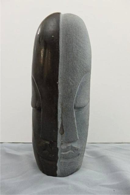Stone Carving: 2 faced cylindrical statue, measures 10.5" x 4.25"x 4.25", Weight approx. 15-20 lbs Artist: Simba Title: My Shadow and I Medium: Spring stone