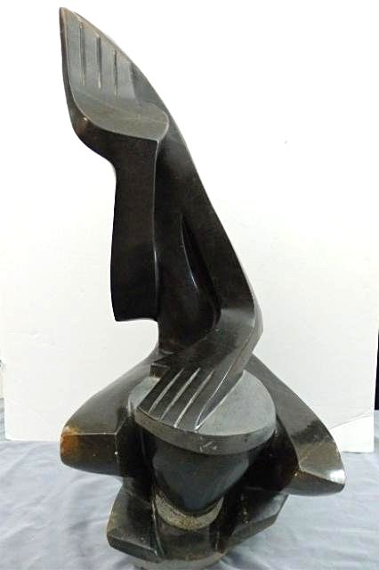 Stone Carving: Drummer measures 30"x 12" W x 11"D,signed Fungai Chirambadare, weight apprx. 50-70 lbs Artist: Fungai Chirambadare Title: Drummer Medium: Spring stone