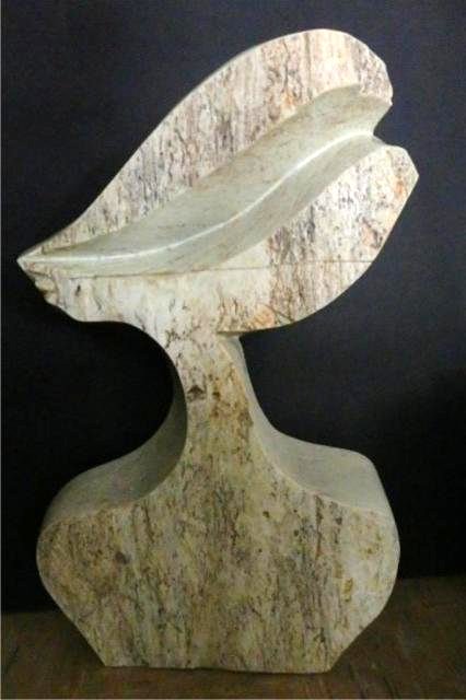 Stone Carving: Profile of Woman, measures 29.5" x 18" x 5", Weight approx. 80-100 lbs Artist: T. Bonjisi Title: Mermaid Medium: Leopard rock