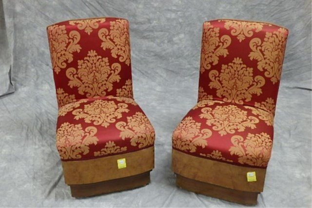 Pair of Chairs: Pair of Art Deco chairs with red upholstering, seat 13," back height 28," chair 17" deep x 18" wide.