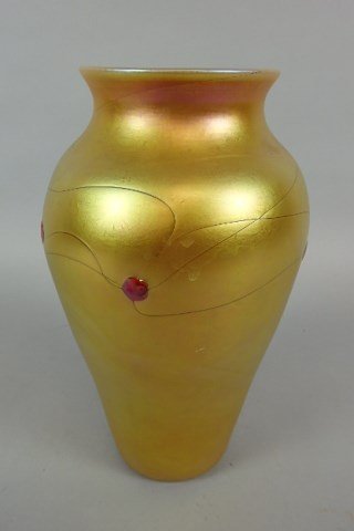 Art Glass Vase: 11.5" with a 4.5" opening iridescent gold art glass vase, with five red cherry-like dollops surrounding upper part of vase, signed LC Tiffany Favrile.