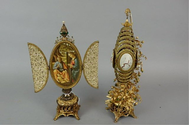 Lot of Two Elaborate Hand-Carved Eggs: Large egg, 11.5" tall with a pair of hinged door to 7.5" exposing a panel of reglious scene of Mary Joseph and Baby Jesus, Christmas Eve, 1972, has a mechanism for a battery to light up the egg; other