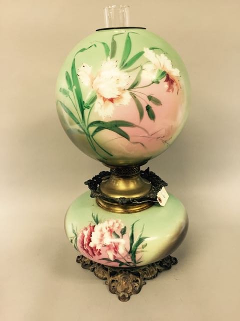 Gone With The Wind Lamp: 22" T handpainted globe and base lamp, ornate brass footed base, green background with white and pink flowers.