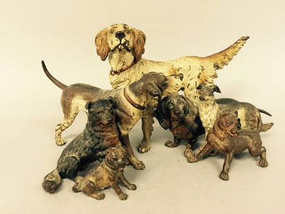 Bronze Sculpture: Bronze cold painted 7" x 13" x 6" grouping of seven various breeds of sport dogs, some paint loss.