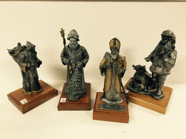 Four Pewter Santa Sculptures (1 of 3)