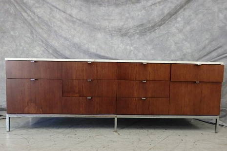 Florence Knoll credenza: Florence Knoll marble top credenza with key , 26” H, 74 1/2 L, 18” W.small chip in marble top in the rear left corner, discoloration on front lower left.Average wear due to age. Overall