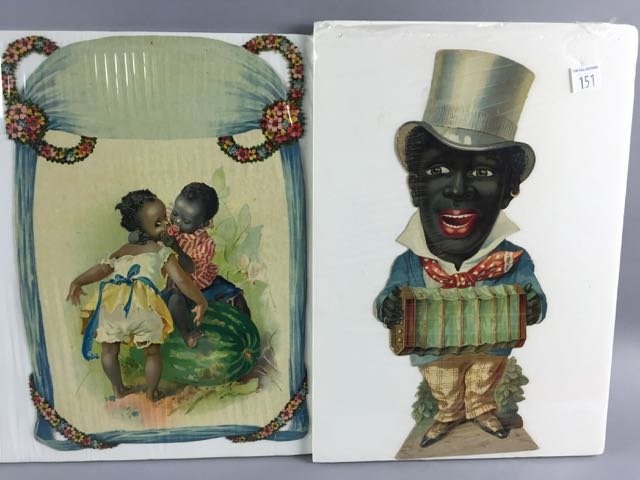3 Colorful Stereotypical Paper Cutouts: Stereotypical caricatures of African-americans. 1) 11" tall Valentine cutout depicting 2 African American children together - boy holding gun and straight razor. 2) 11.5" tall paper cutout depicting A