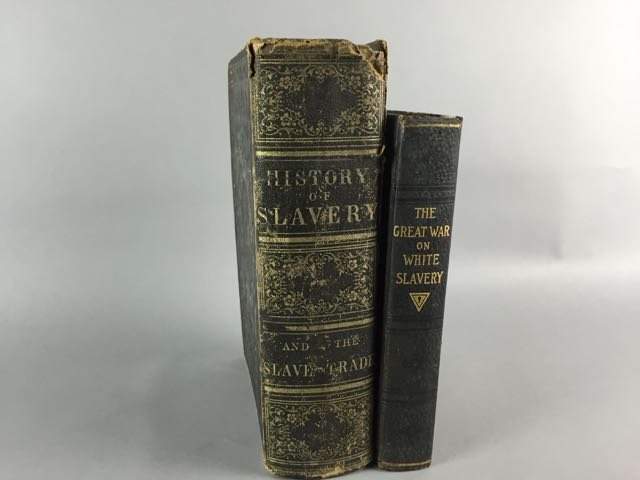 2 Books About Slavery: The History of Slavery and the Slave Trade, J & H. Miller, Columbus, Ohio, 1859. Wear to covers and spine; cover loss on spine, spine separating, toning and foxing throughout. "the Great War on White 