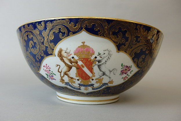 Porcelain Bowl with Duke of Windsor Coat of Arms: 4 1/4 inches tall, nine and three-quarter inch wide, four panel decoration of flowers and coat of arms, Sola, Virtus, Invicta, sign with a blue mark on the base, " Virtue alone is unconquered"