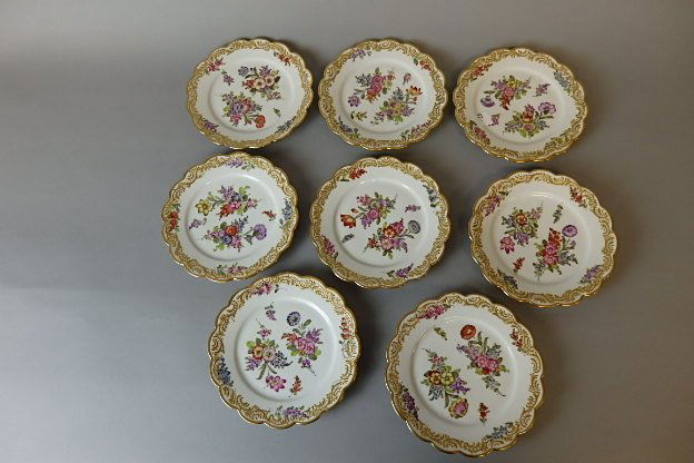 8 Meissen Plates: (8) 7 inch scalloped rim plates, floral hand paint decoration with raised gold enamel on the rim, cross swords mark, France