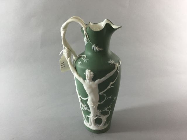 Volkstedt Jasperware pitcher: 10" Jasperware 3 dimensional pitcher with twisted tree branch handle, raised relief of nude male, Volkstedt mark, Germany on base