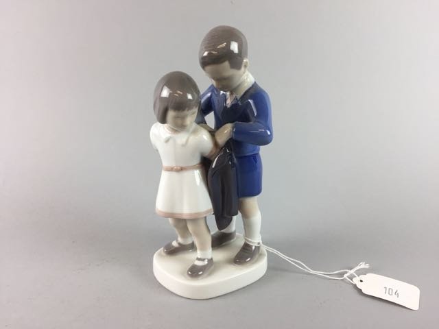 Bing and Grundel Figure: 7" B&G figure of boy helping girl with coat